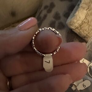 Elegant Silver Braided Eternity Ring